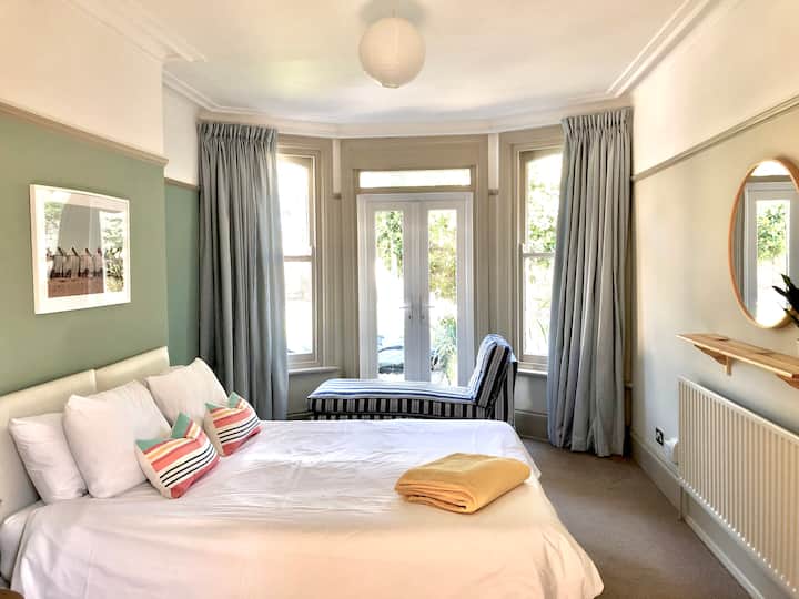 Bedroom 1 - Ground floor bedroom with patio doors to garden.
