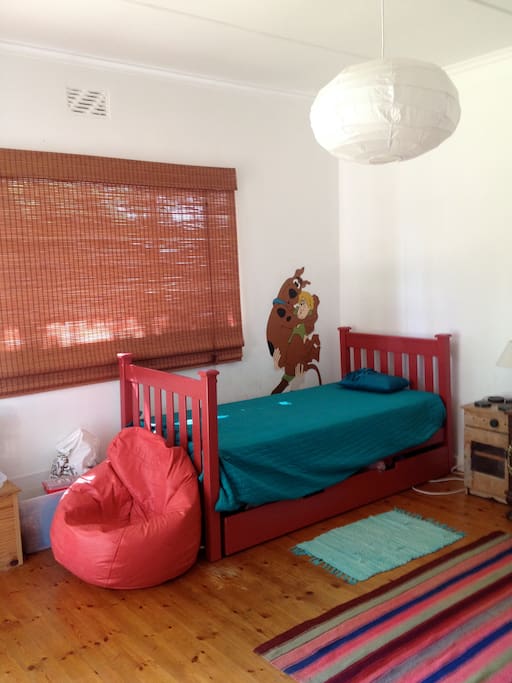 large bedroom with exit to garden