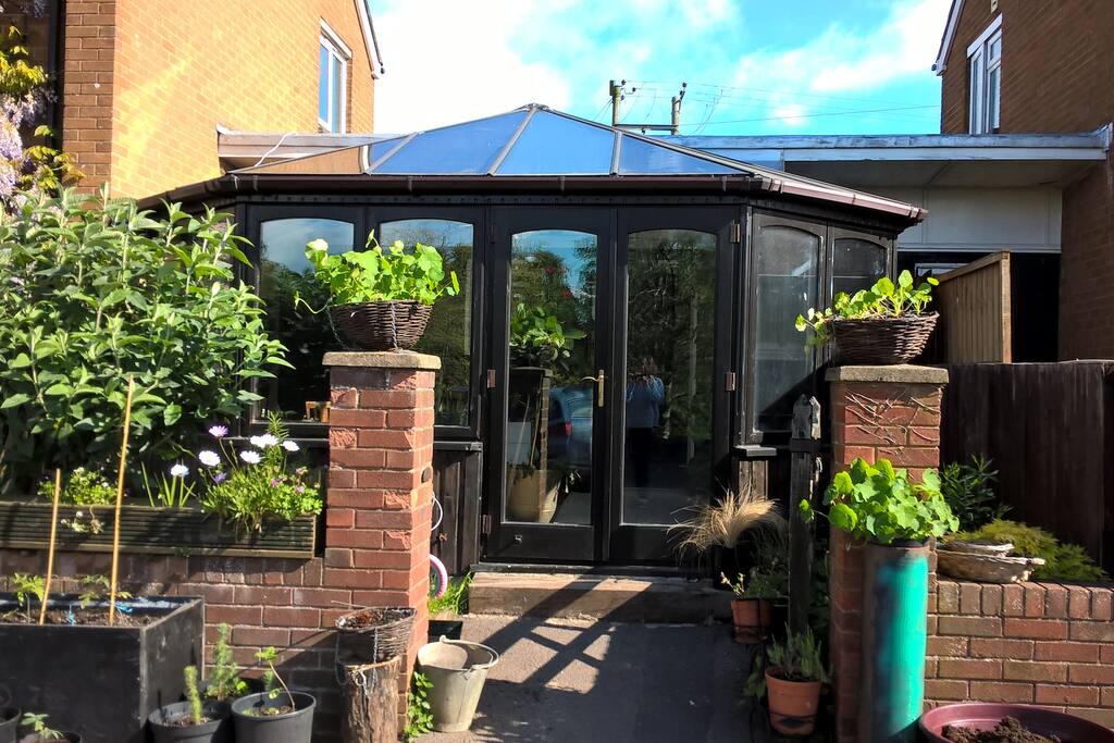 Access is through the conservatory