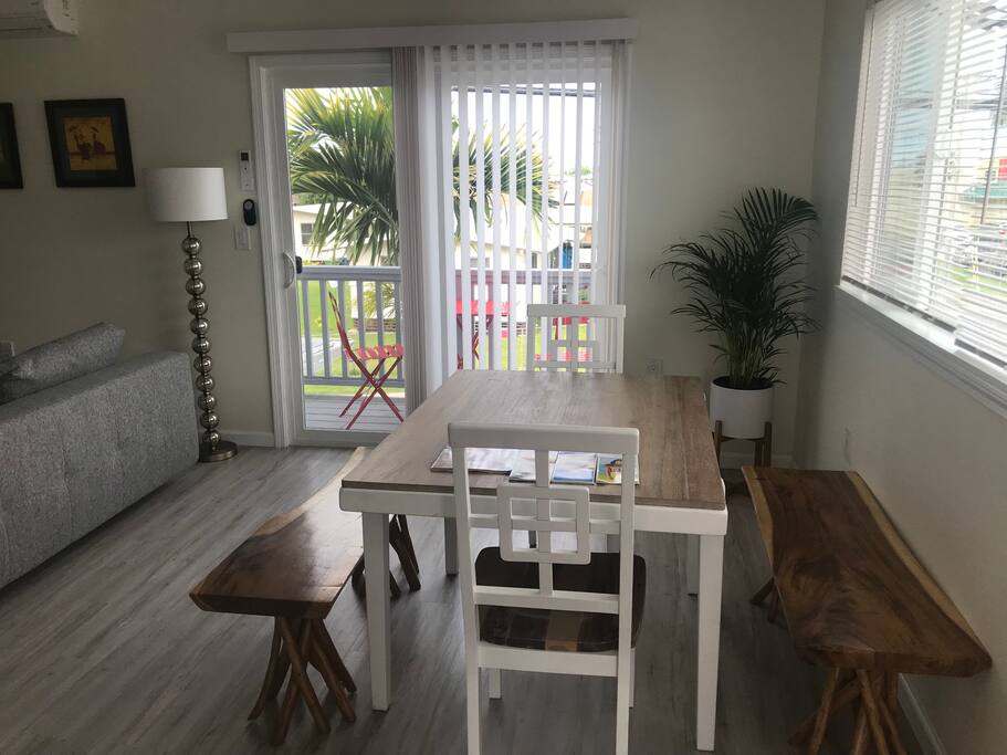 Dining table and outdoor seating for you to enjoy your morning coffee!
