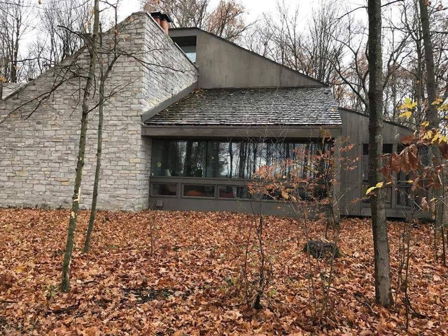 side facade view and glass windows in living room