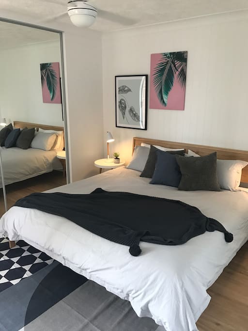 Master Bedroom with King bed and ensuite and small balcony.