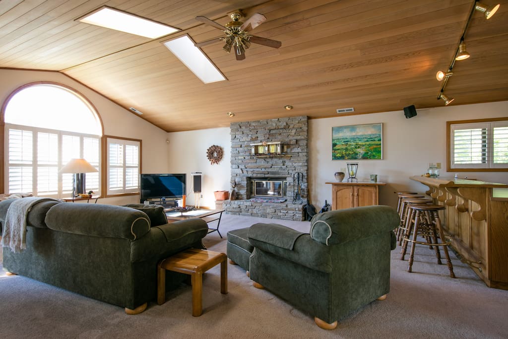 Living area has views of the water and surrounding mountains