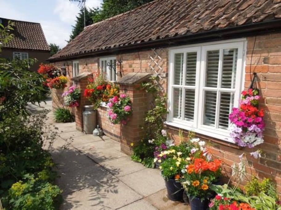 The outside of the garden room.