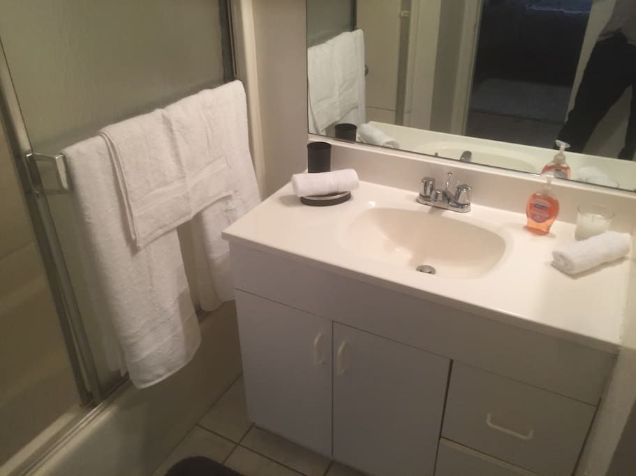 Hallway bathroom with shower