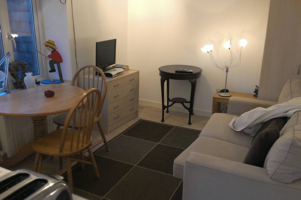 Lounge/dining area again with Sky TV.