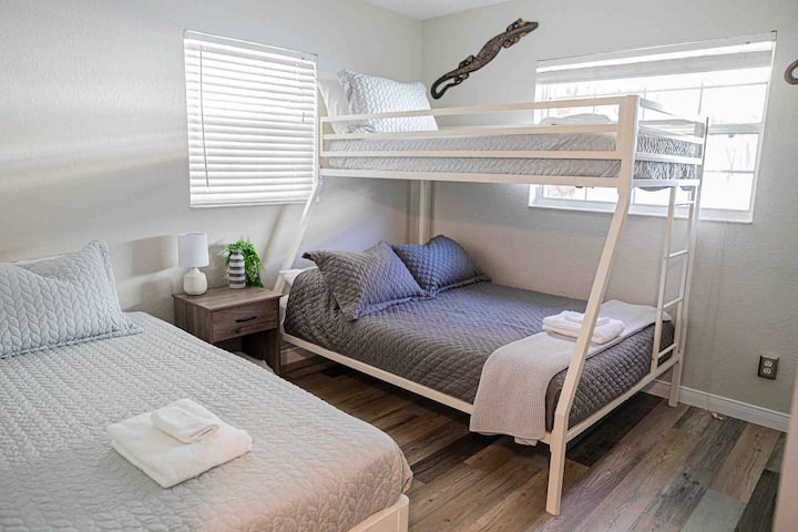 The room also includes a dresser, TV, fan, night stand and closet as well!