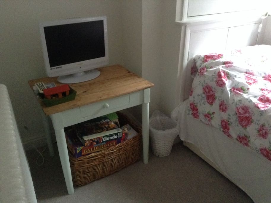 Twin room with small table DVD players