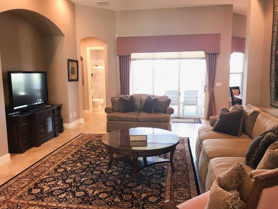 Living Room with sliders to pool & lanai