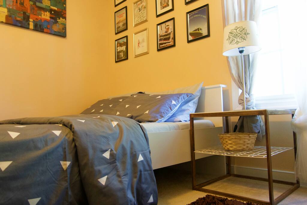 Comfortable queen size bed and lots of sunlight