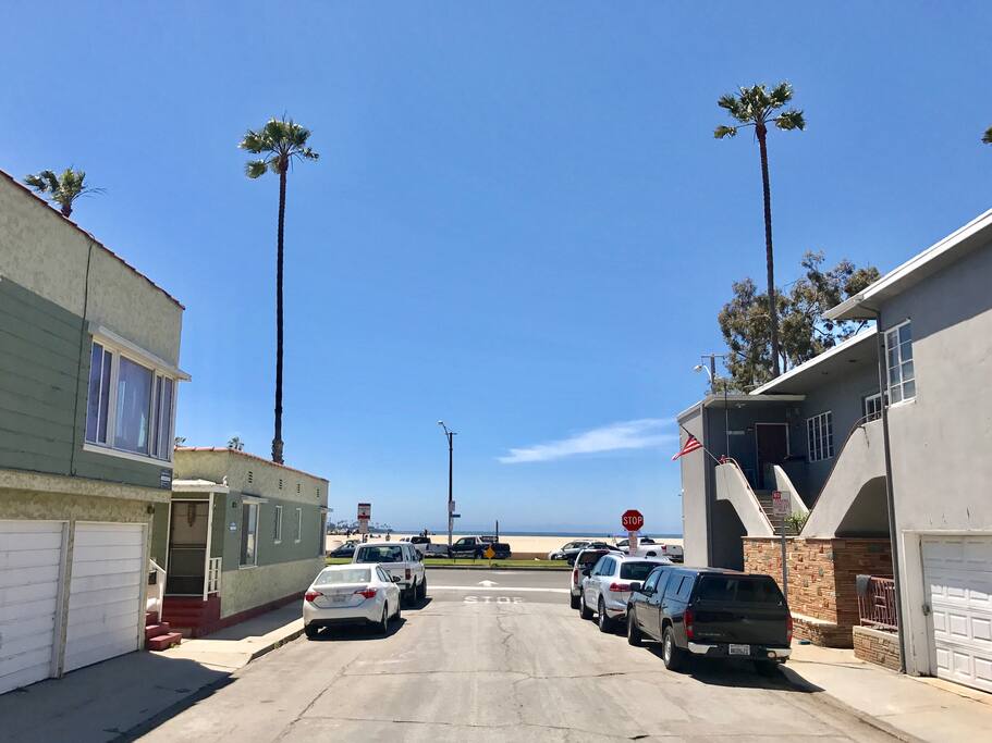 The beach is just steps away from the front of property!