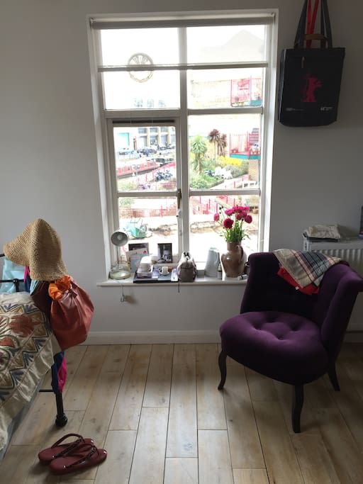 Windows from two sides in bedroom ensure it's full of light throughout the day