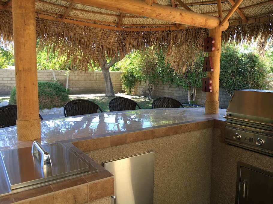 Enjoy your favorite cocktails sitting at the poolside bar.