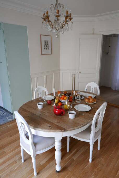 The dining room is decorated in a neo-Gustavian style with a large table extends for larger meals.