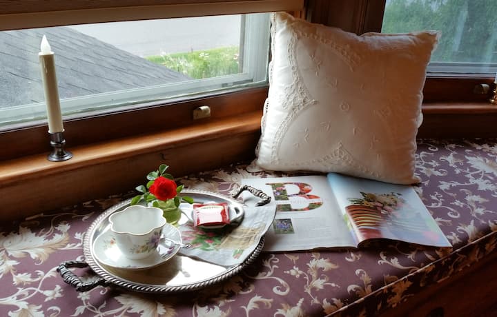 Plum Garden window seat is perfect for reading and relaxing