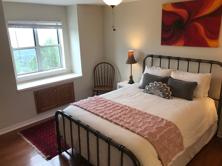 Bedroom 4 upstairs, queen bed and private bath