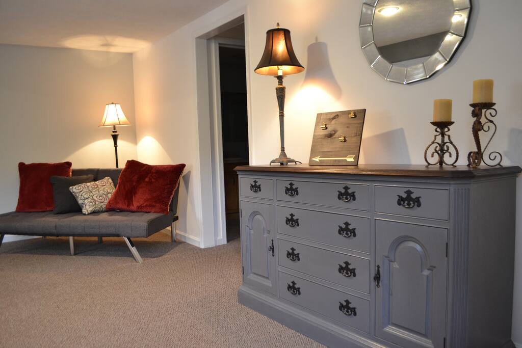 The foyer and living room offer ample space for gathering