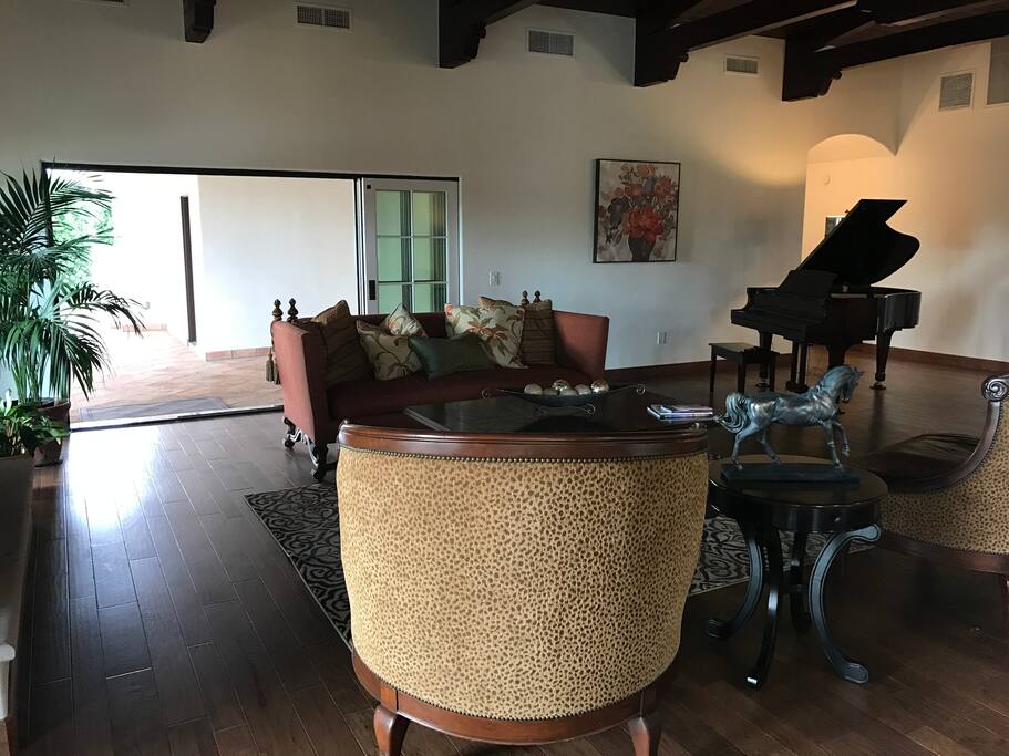 Great room has slider doors opening up the entire area to the outdoors.