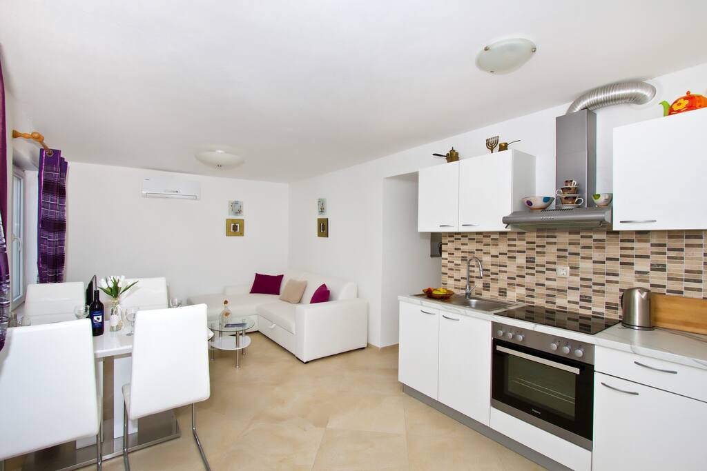 Living room, kitchen and dining area