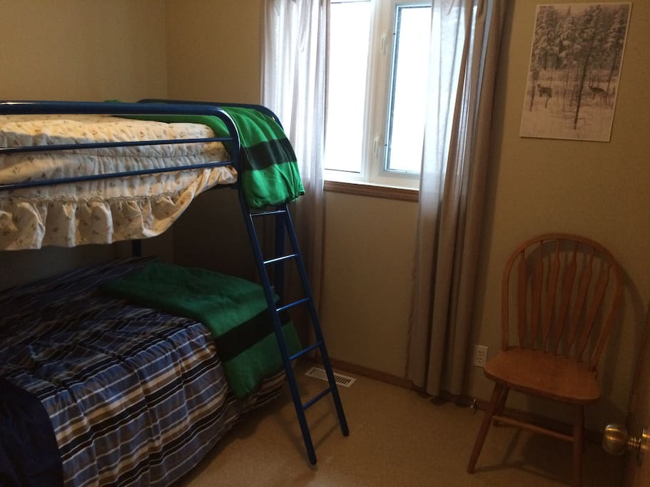 Spare bedroom with twin sized bunk beds