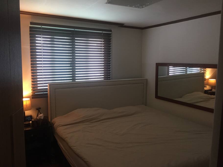 The main bedroom has a new American king size bed with a memory foam mattress. It's so big I'm pretty sure it has it's own zip code.