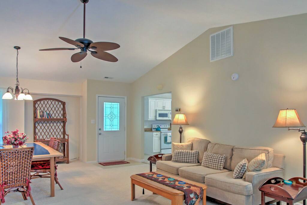 High vaulted ceilings welcome you into the home's open-concept living space.