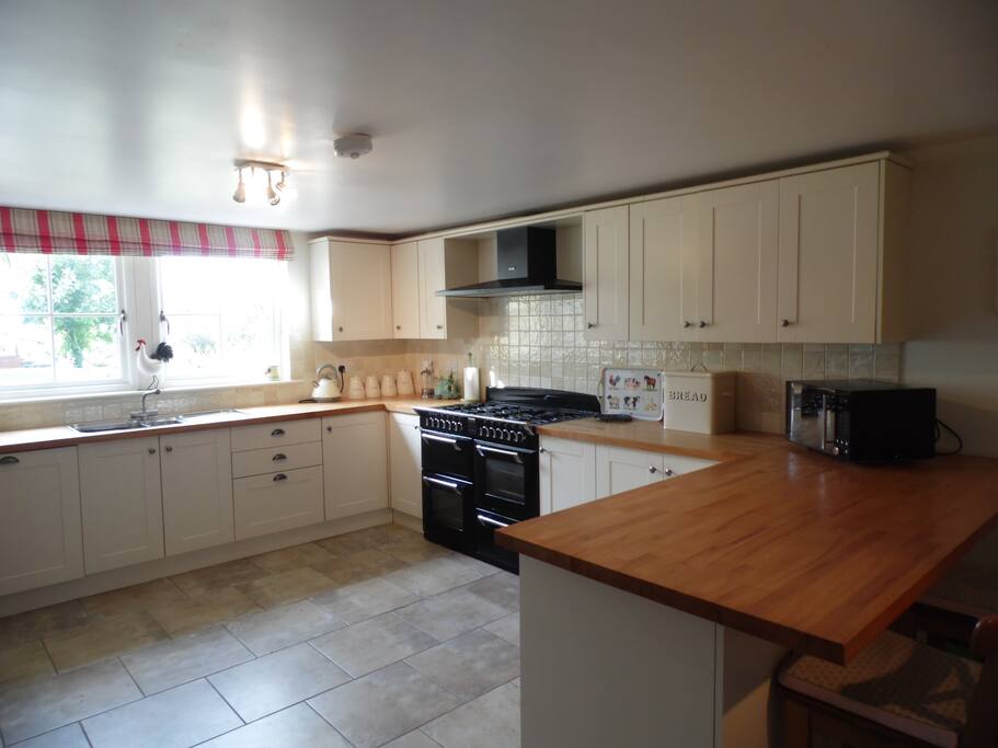 Large farmhouse kitchen with range cooker