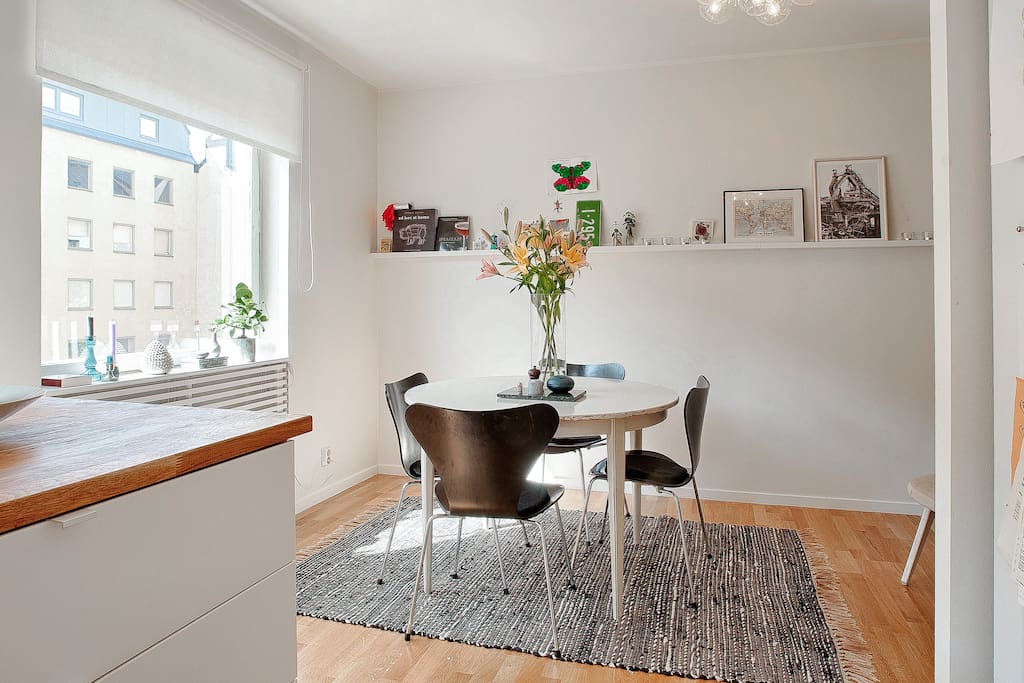 Dining area with extendable table that can seat eight people.