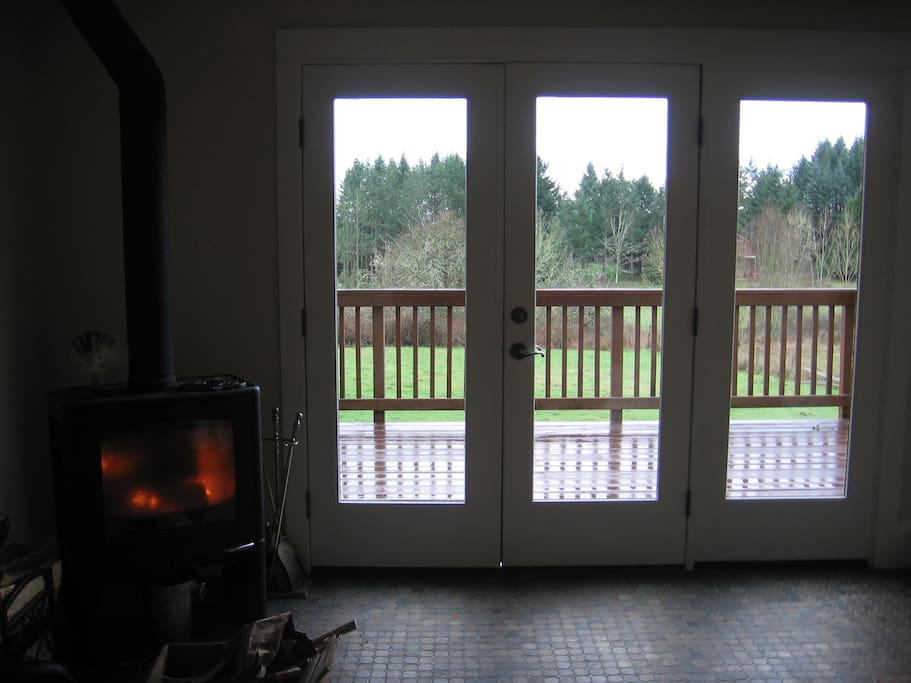 ...come in through the French door and into a cozy fireside sitting room...