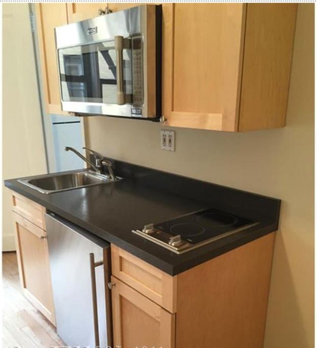 Newly renovated and kitchen with high efficiency, stainless steel appliances. I have stocked the pantry with a few breakfast essentials like tea, oatmeal, and coffee. There is also sufficient cookware, plateware, and silverware for you to prep and enjoy your meals from home!