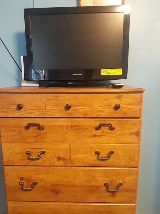 Chest of drawers and tv