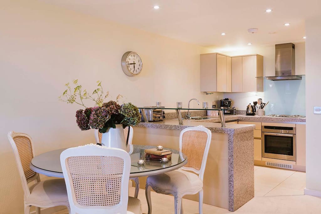 Open plan dining and kitchen with all the mod cons you may need during your stay