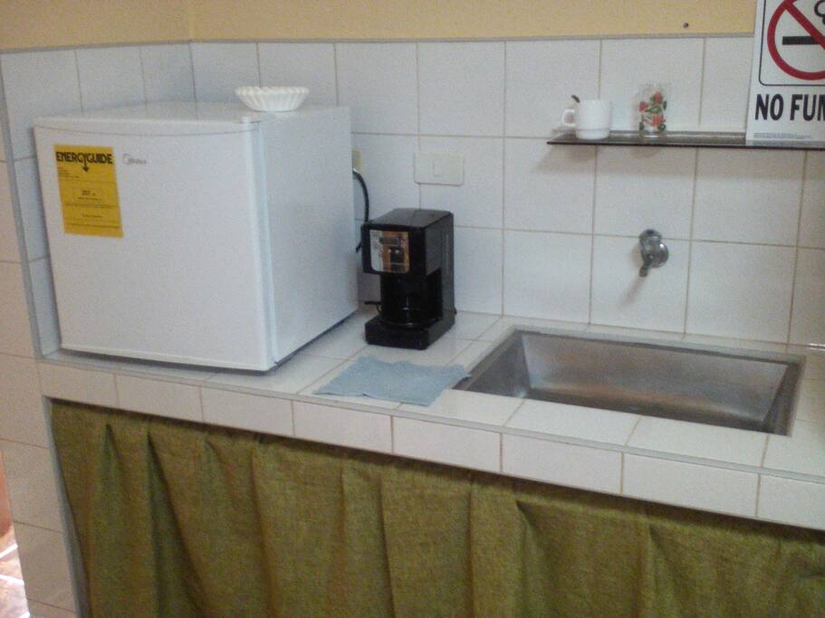 Rooms offer mini fridges and coffee makers