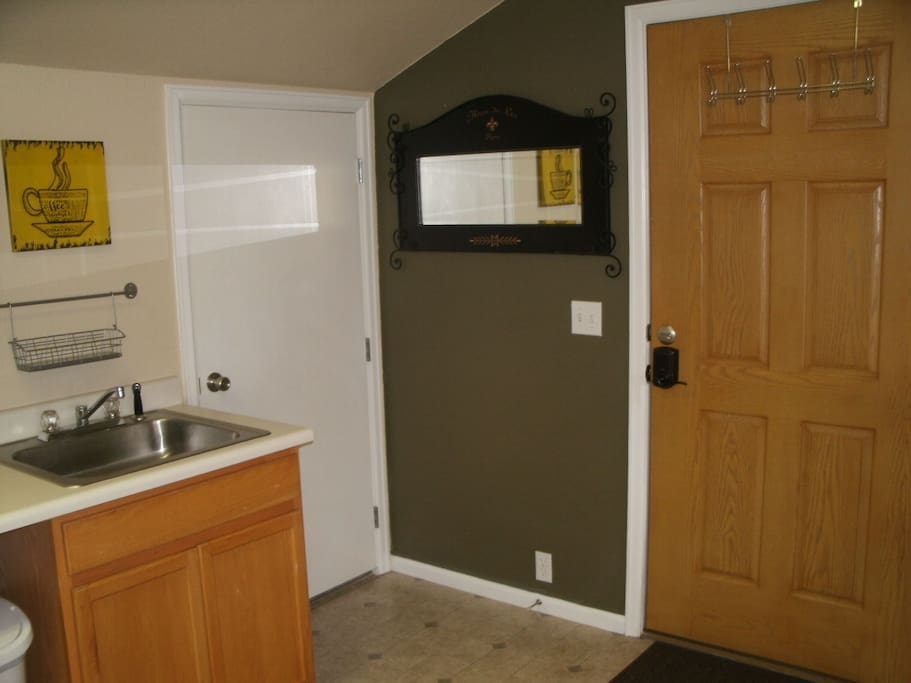 Front entry and closet with storage area