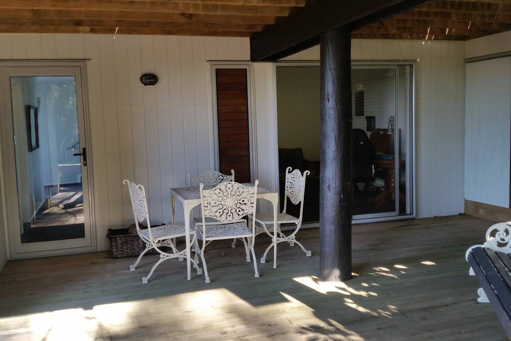 A private deck is outside the living space