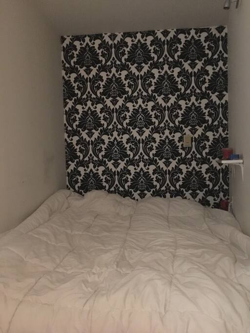 Separate bedroom nook with queen size bed