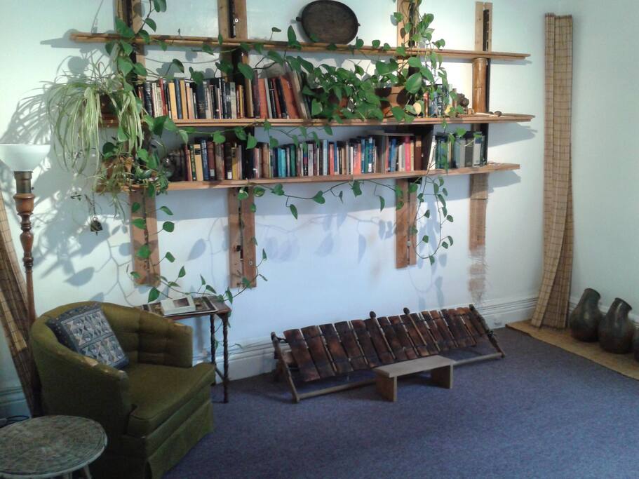 Sun room, with musical instruments and lots of reading material.