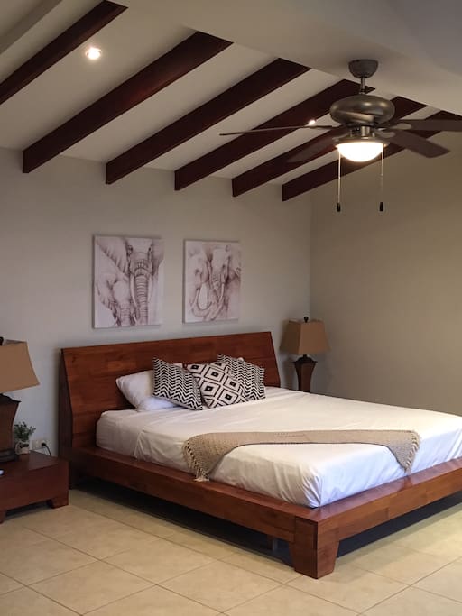 Upstairs Master Bedroom with en-suite bathroom, private balcony and ocean views