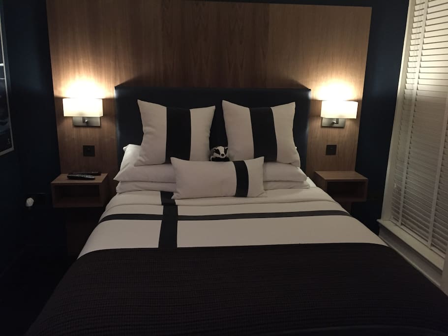 Bedroom has full sky tv package on flat screen wall mounted tv too