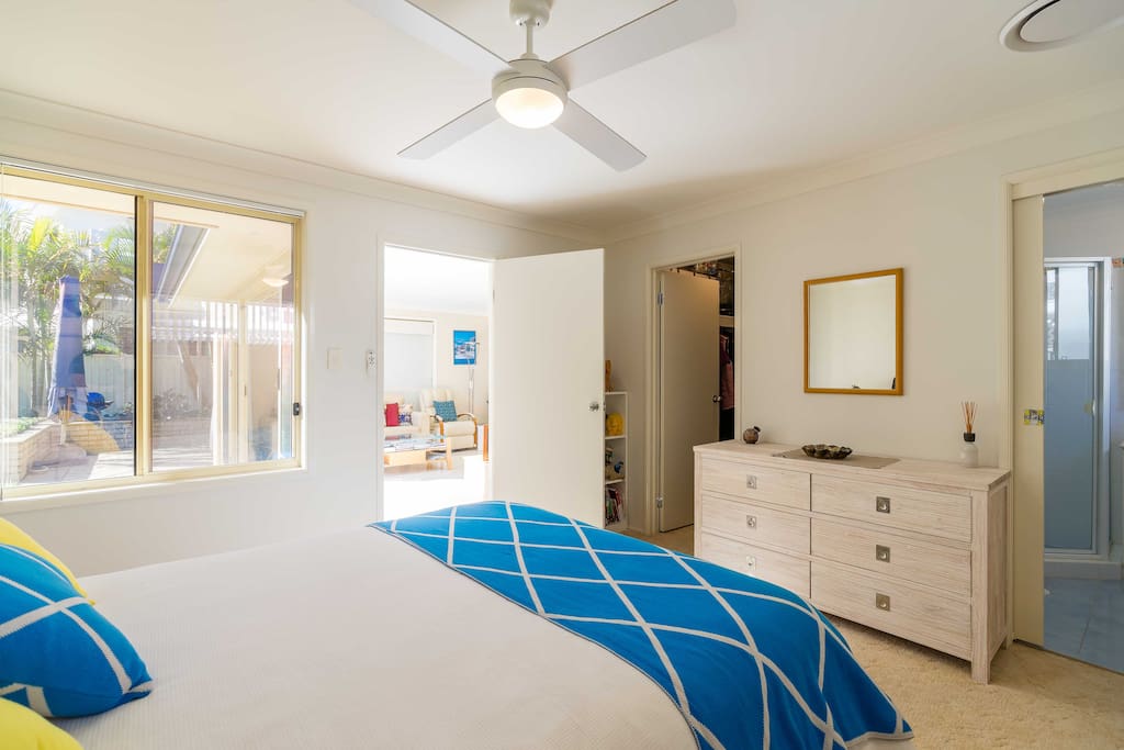 Guest bedroom contains walk-in wardrobe and ensuite