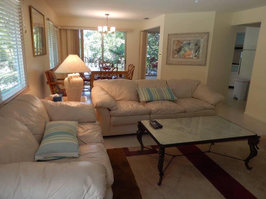 Living room with dining table beyond