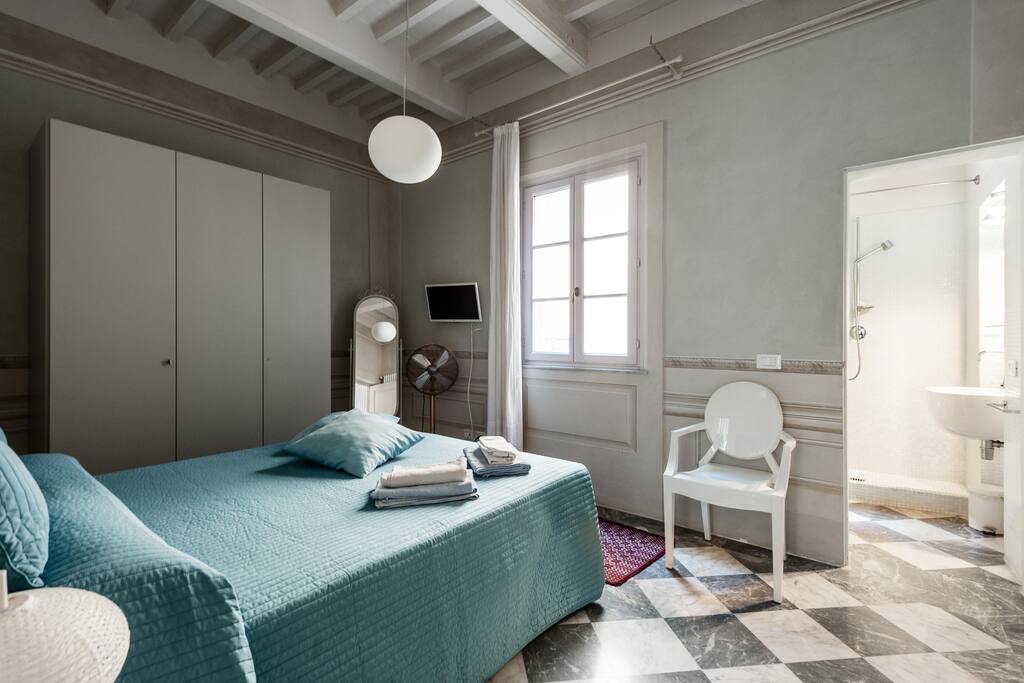 Blue bedroom with bathroom