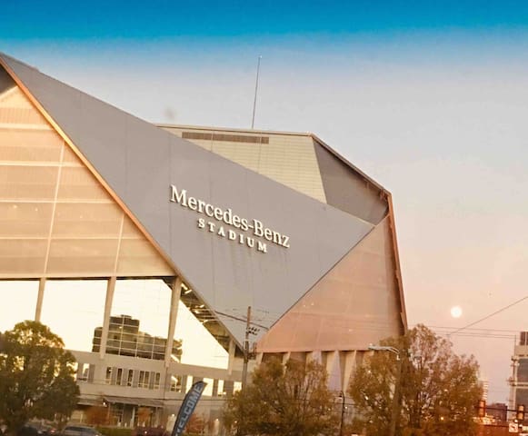 King Size Bed laying in the heart of the city!