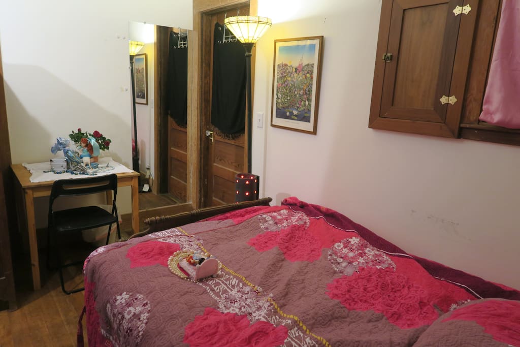 Double bed upstairs from bathroom