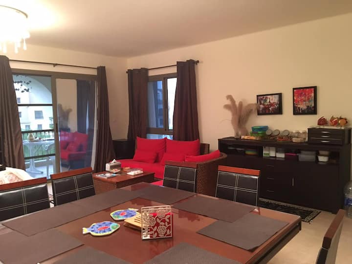 As you enter the apartment, you will find yourself in a cozy family space. You can relax or entertain friends , with plenty of seating for everyone.
You have access to the balcony where you can enjoy the cool breeze most of the day. 