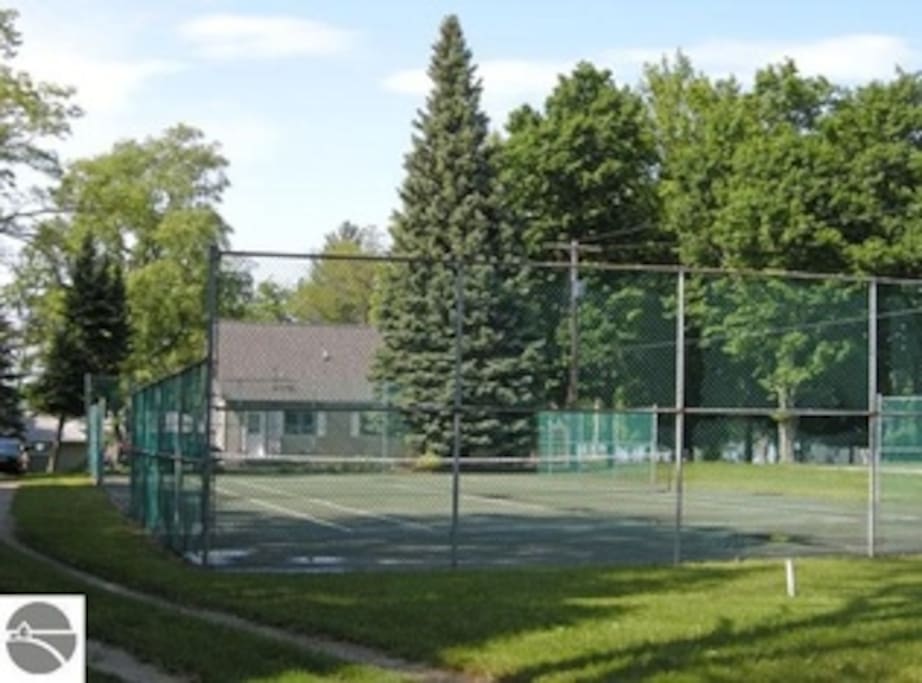 Private tennis court on the property