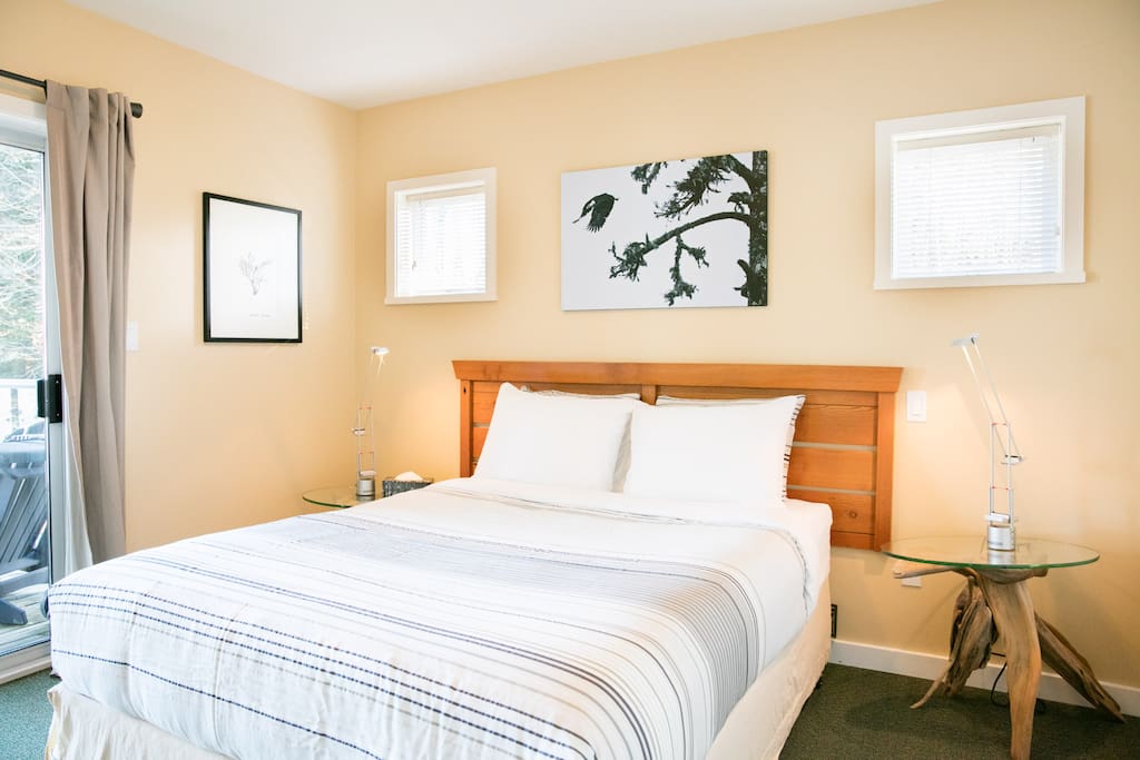 New King size bed (not pictured) with a view! Walk in closet and a glass door out to your private deck.