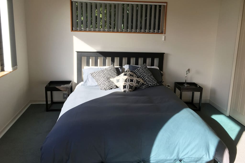 Lay in bed, read and take in the lush surrounds.