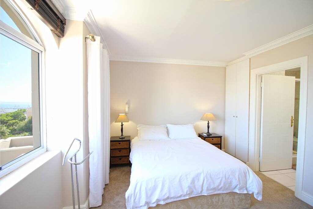 Master bedroom with comfortable queen bed and en-suite bathroom