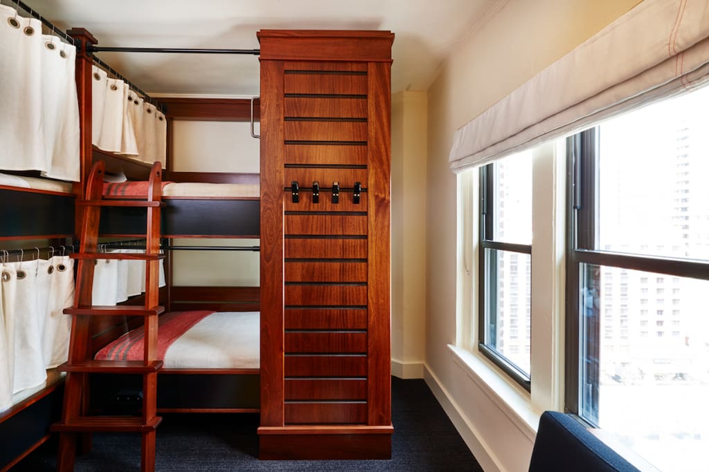 Our bunks are designed for privacy, each featuring a curtain, reading light, and power outlet.